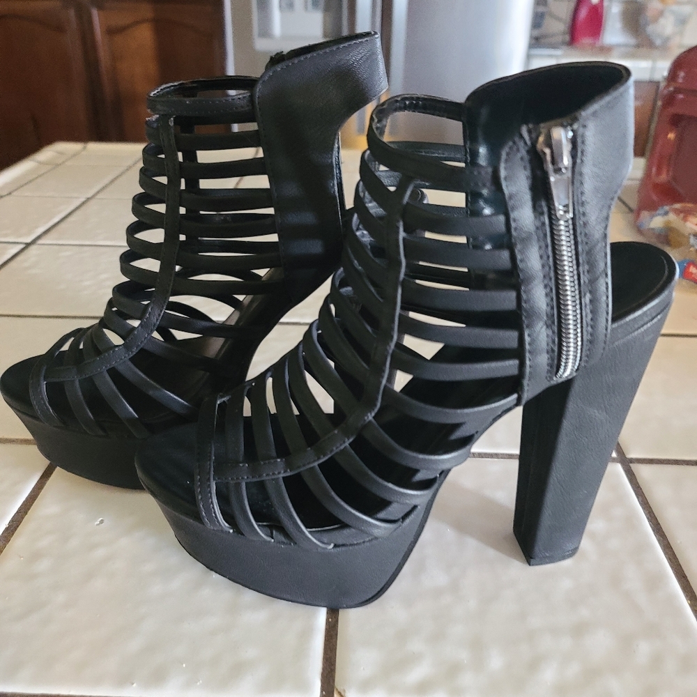 Speed Limit 98 Melrose black caged platform heels